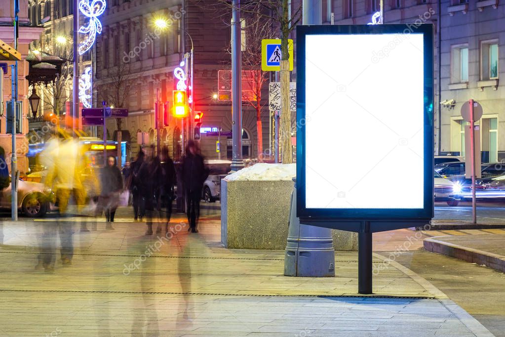 Moscow, Russia - March, 23, 2018: Landscape with the image of night Moscow with billboard on a frontground