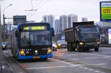 Moscow, Russia - February, 18, 2020: image of a bus near a bus stop in Moscow