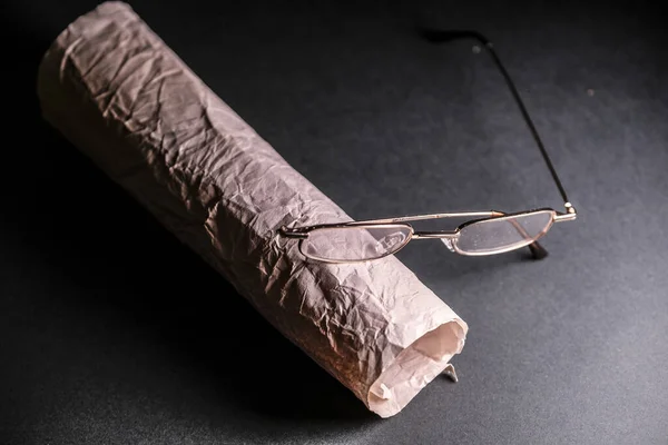 Image Glasses Crumpled Aged Paper Wound Roll — Stock Photo, Image