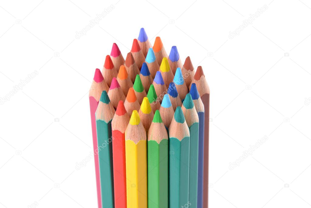 Assortment of colored pencils isolated over white