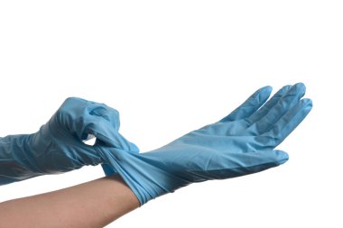 Beyaz arka planda mavi koruyucu eldivenli el