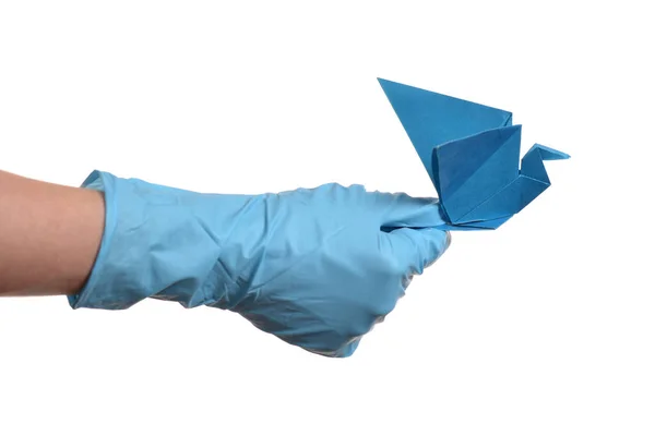 Origami Papier Żuraw Ręku Gumowymi Rękawiczkami Białym — Zdjęcie stockowe