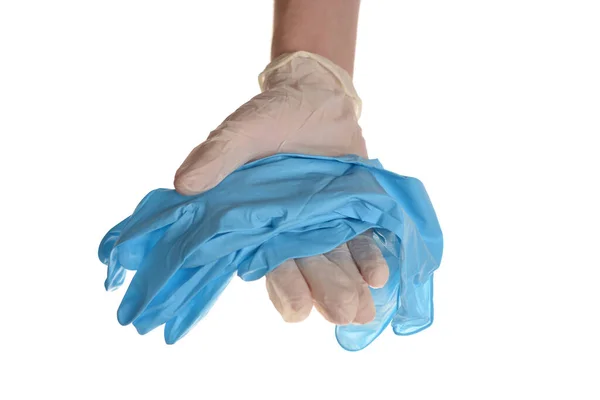 Ręka Rękawiczkami Daje Kolejne Rękawiczki Dla Bezpieczeństwa Nad Whitem — Zdjęcie stockowe