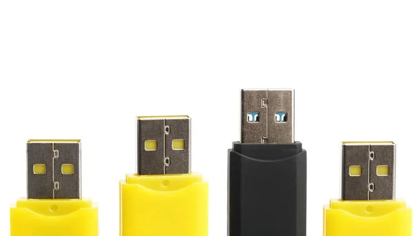 Unidades flash USB amarillas y negras — Foto de Stock