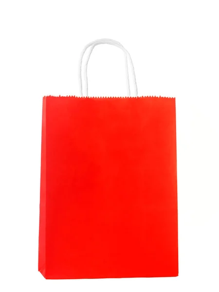 Papír piros bevásárló vagy ajándék táska elszigetelt fehér háttér — Stock Fotó