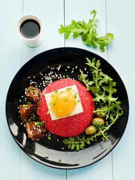 Rice with tofu and egg yolk — Stock Photo, Image