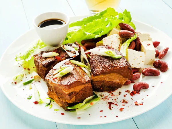 Pork ribs with soy sauce and beer — Stock Photo, Image