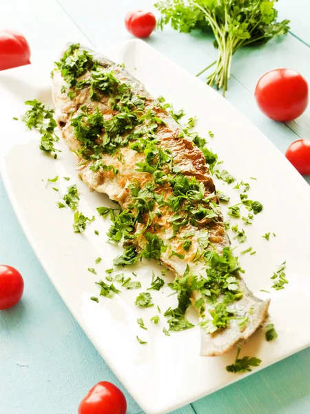 Baked carpenter with herbs — Stock Photo, Image