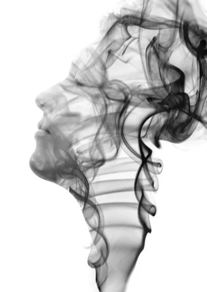 Female profile combined with smoke — Stock Photo, Image