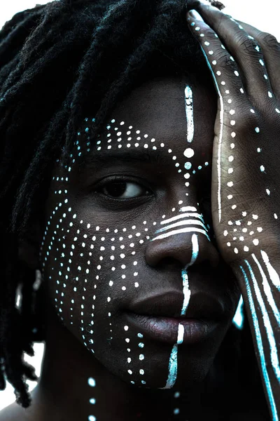 Black man with traditional face painting — Stock Photo, Image