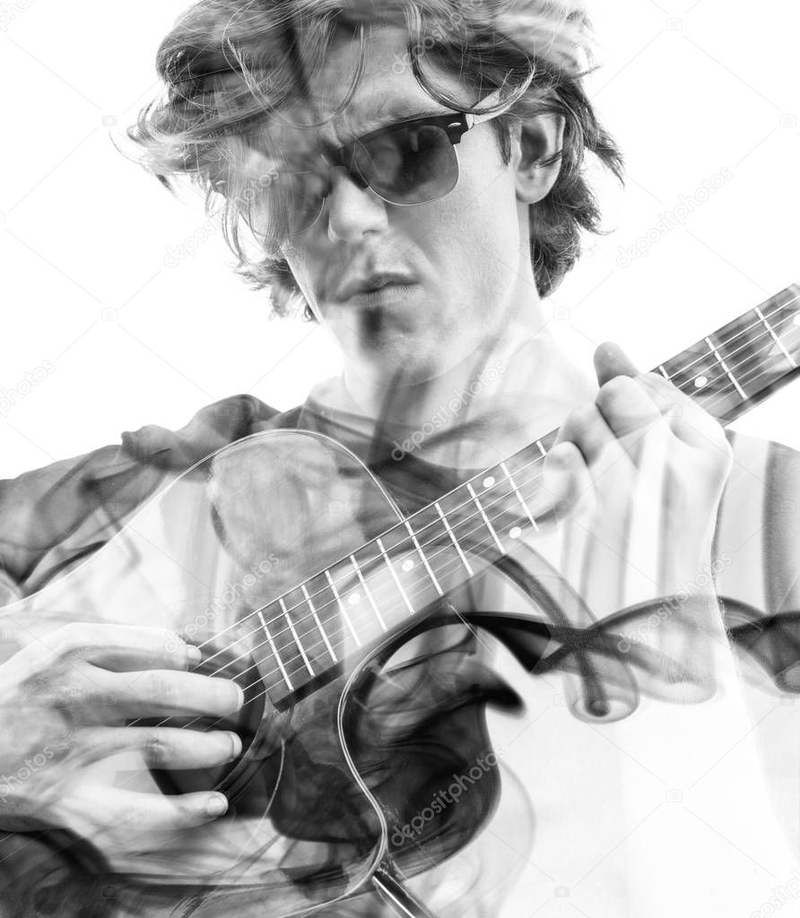 Man playing guitar combined with smoke 