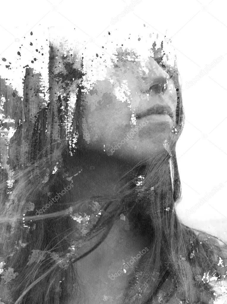 Paintography. Double exposure. Close up of an attractive model combined with hand painting