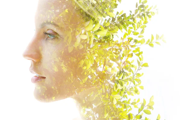 Double exposure of a healthy natural beauty's profile combined w — Stock Photo, Image