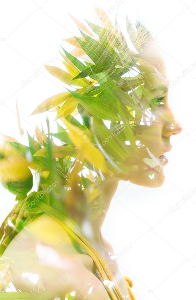 Double exposure portrait of a young woman