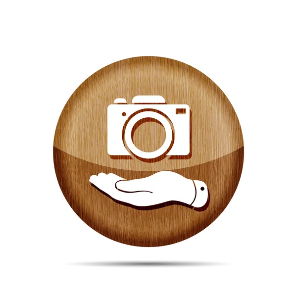 Hand shows the photo camera icon — Stock Vector