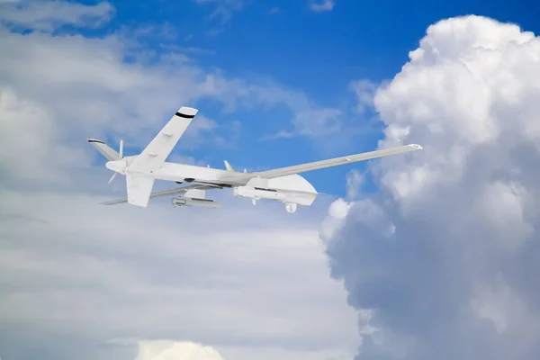 military RC military drone flies against the backdrop of blue peaceful sky with white clouds