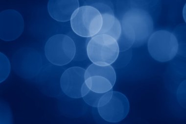 soyut bulanık dairesel bokeh ışıkları 2020 yılının modaya uygun Klasik Mavi renginde arka plan tonu