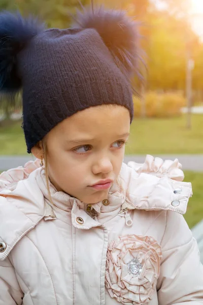 Frowning Girl Hat Transitional Season Outdoors — Stock Photo, Image