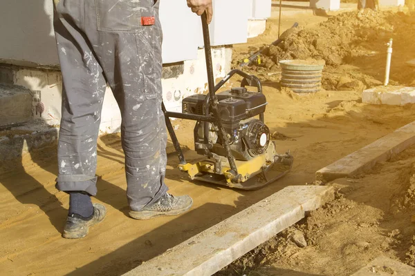 Worker Compresses Sand Blind Area Building Special Working Tool Tamping — Stock Photo, Image