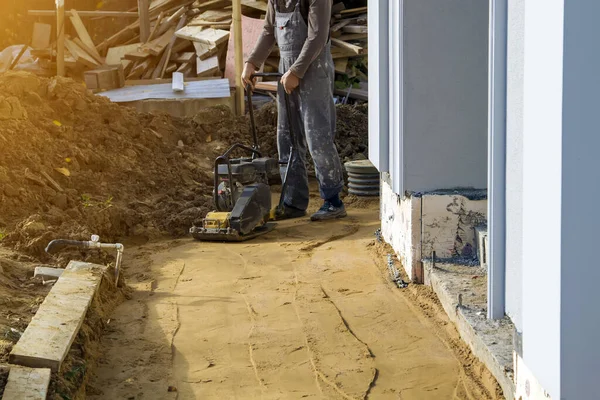 Worker Compresses Sand Blind Area Building Special Working Tool Tamping — Stock Photo, Image