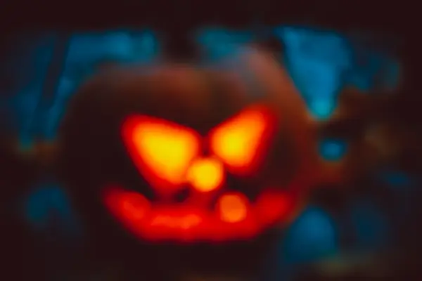 Glowing pumpkin in darkness — Stock Photo, Image