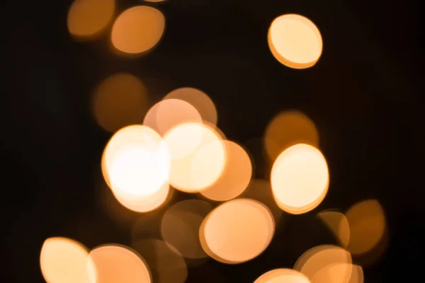 Defokussierte goldene Weihnachtsglitzerlichter — Stockfoto