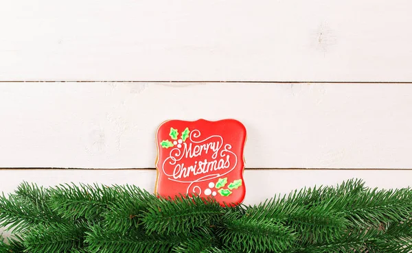 Kerstboom takken en Gingerbreads — Stockfoto