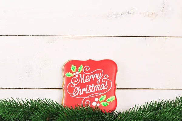 Kerstboom takken en Gingerbreads — Stockfoto