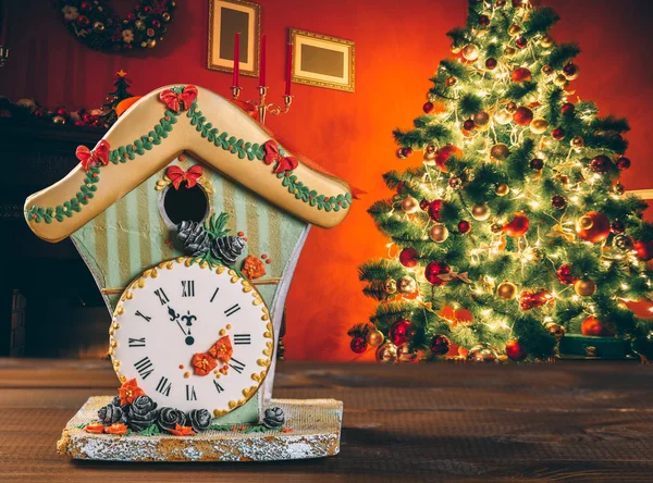 Christmas gingerbread house with clock — Stock Photo, Image