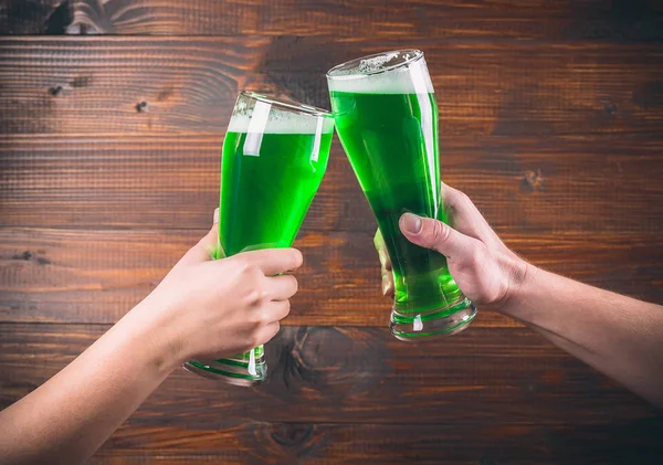 Glasses of green beer — Stock Photo, Image