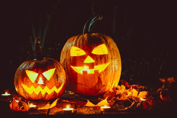 Halloween pumpor huvud jack lyktor — Stockfoto