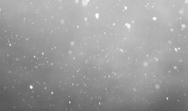 Siyah arkaplana düşen kar.