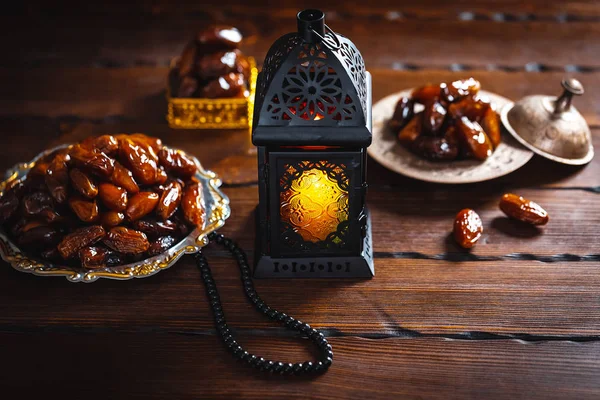 The Muslim feast of the holy month of Ramadan Kareem. Beautiful background with a shining lantern Fanus.