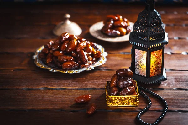 The Muslim feast of the holy month of Ramadan Kareem. Beautiful background with a shining lantern Fanus.