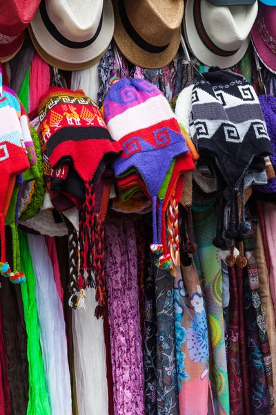 Hats and scarves in a market — Stock Photo, Image