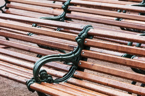 Park benches after rain fall — Stock Photo, Image