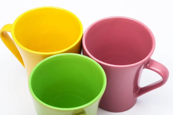Жовті Зелені Рожеві Чашки Кави Білому Тлі — стокове фото