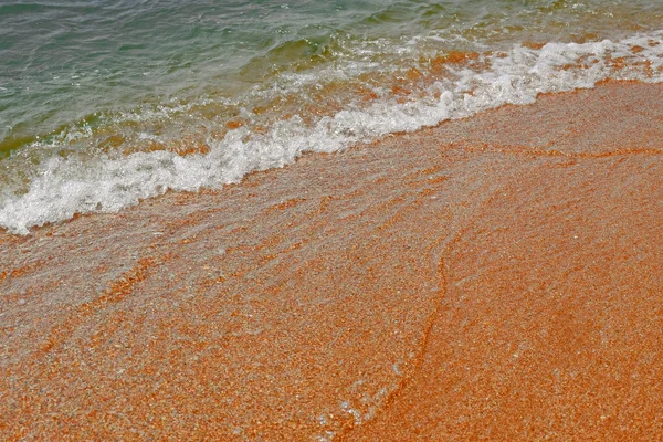 Sea sandy beach under daylight, relaxation point, diagonal viewpoint half land half water — Stock Photo, Image