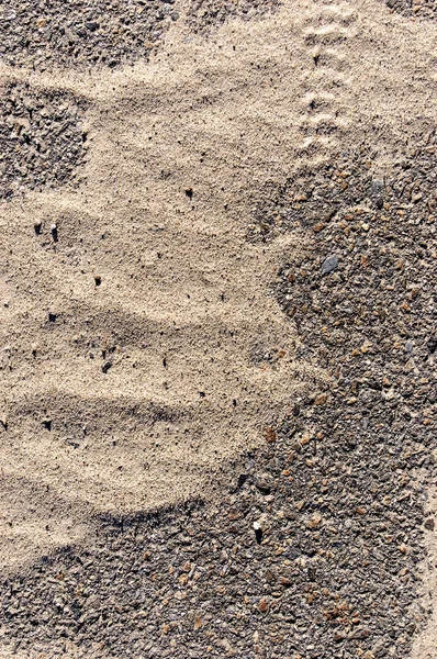 Superfície de estrada de asfalto com filme de areia fina sobre . — Fotografia de Stock