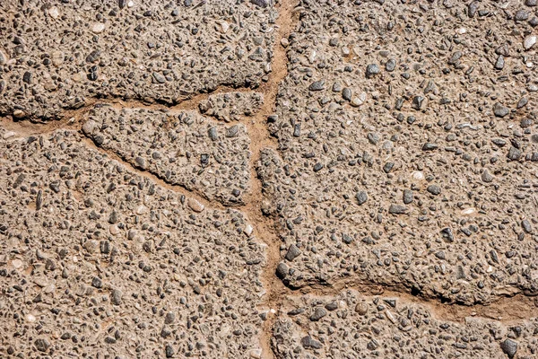 Asfalto agrietado en la superficie de la carretera — Foto de Stock