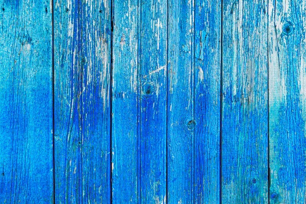 Yarı parlak mavi renkte boyalı eski ahşap duvar