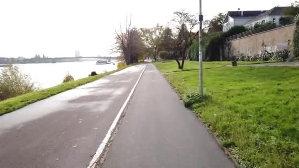 Bonn Germany, 06 November 2019: riding on Rhine embankment toward the Kennedy bridge 4k 50fps — Stock Video