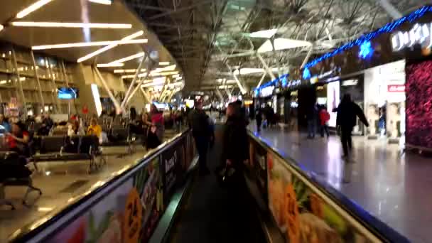 Moscow Russia, 18 грудня 2019: Timelapse of people in Vnukovo Airport on travolators on 1th floor — стокове відео