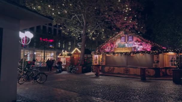 Bonn, Germany - 14 of Dec., 2019: Christmas market in the nighttime.Christmas market stopped working in the dead of night — Stock Video