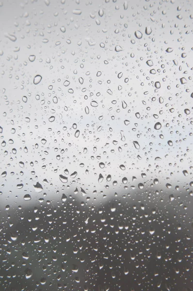 Drops of rain on the window, rainy day — Stok Foto