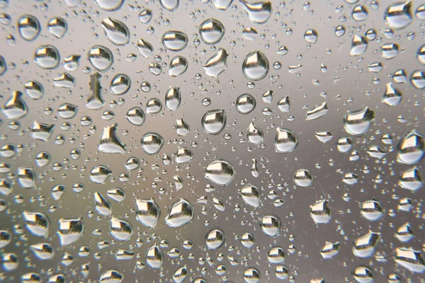 Gotas de lluvia en la ventana — Foto de Stock