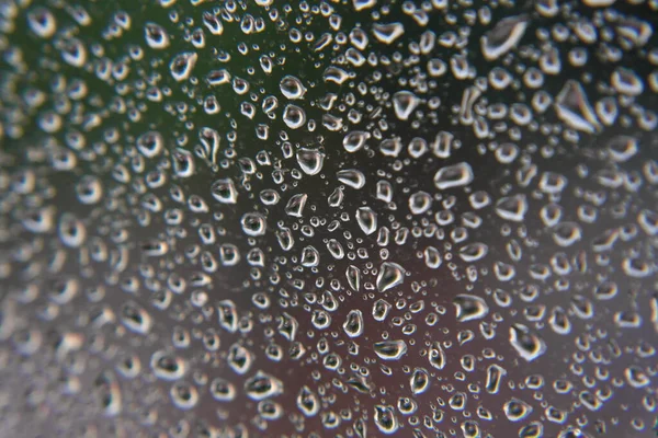 Gotas de lluvia en la ventana — Foto de Stock