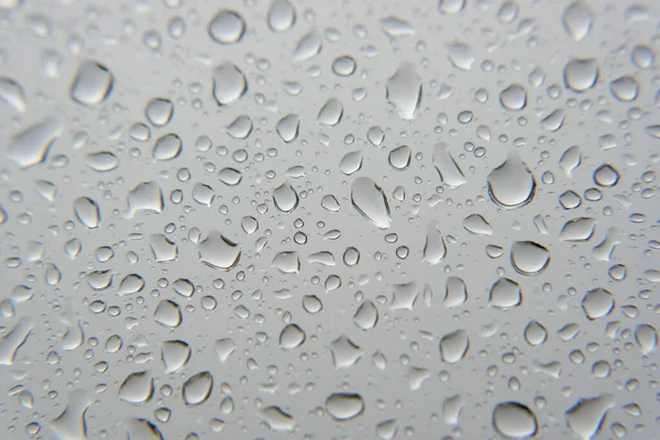 Gotas de lluvia en la ventana — Foto de Stock