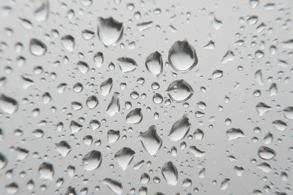 Gotas de lluvia en la ventana — Foto de Stock