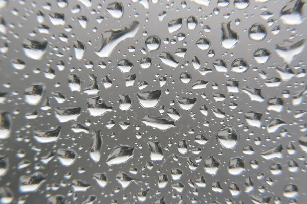 Gotas de lluvia en la ventana — Foto de Stock